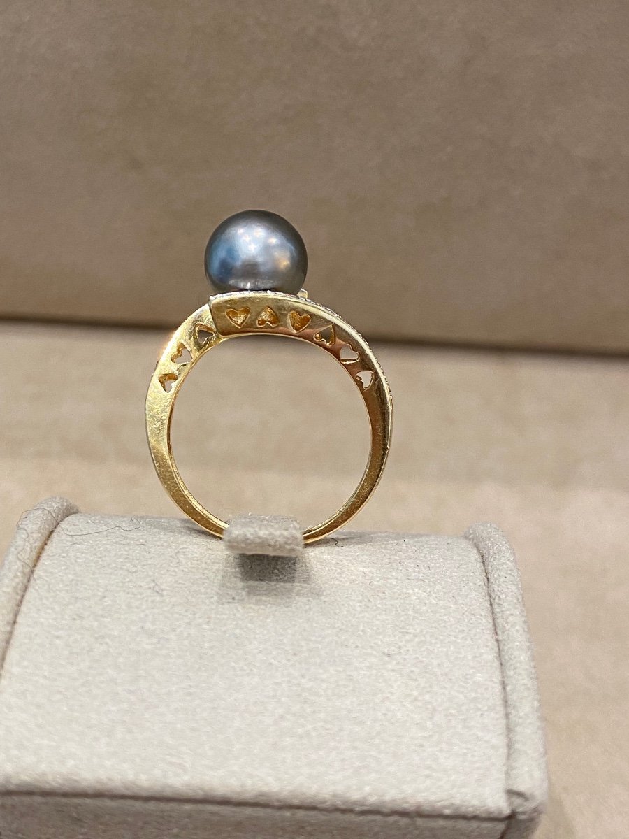 Yellow Gold Ring Decorated With A Tahitian Pearl Placed Between Two Lines Of Diamonds-photo-2