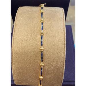 Articulated Gold Bracelet Adorned With Sapphires Punctuated With Diamonds