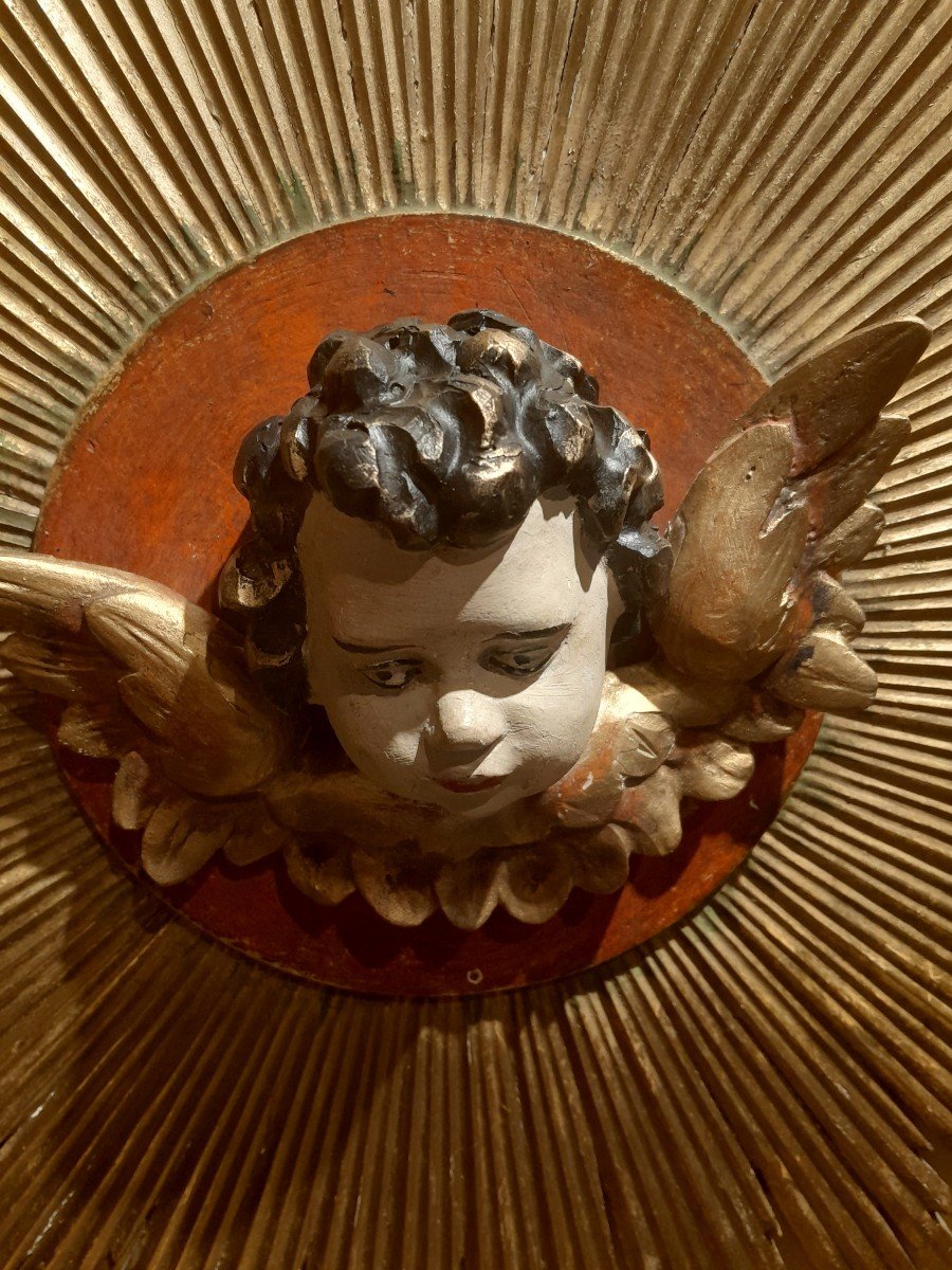 Cherub Head On Sun Background-photo-3