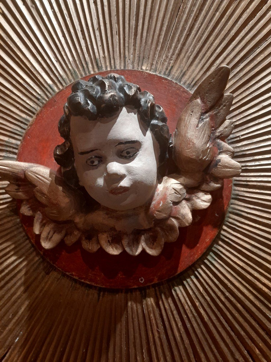 Cherub Head On Sun Background-photo-3