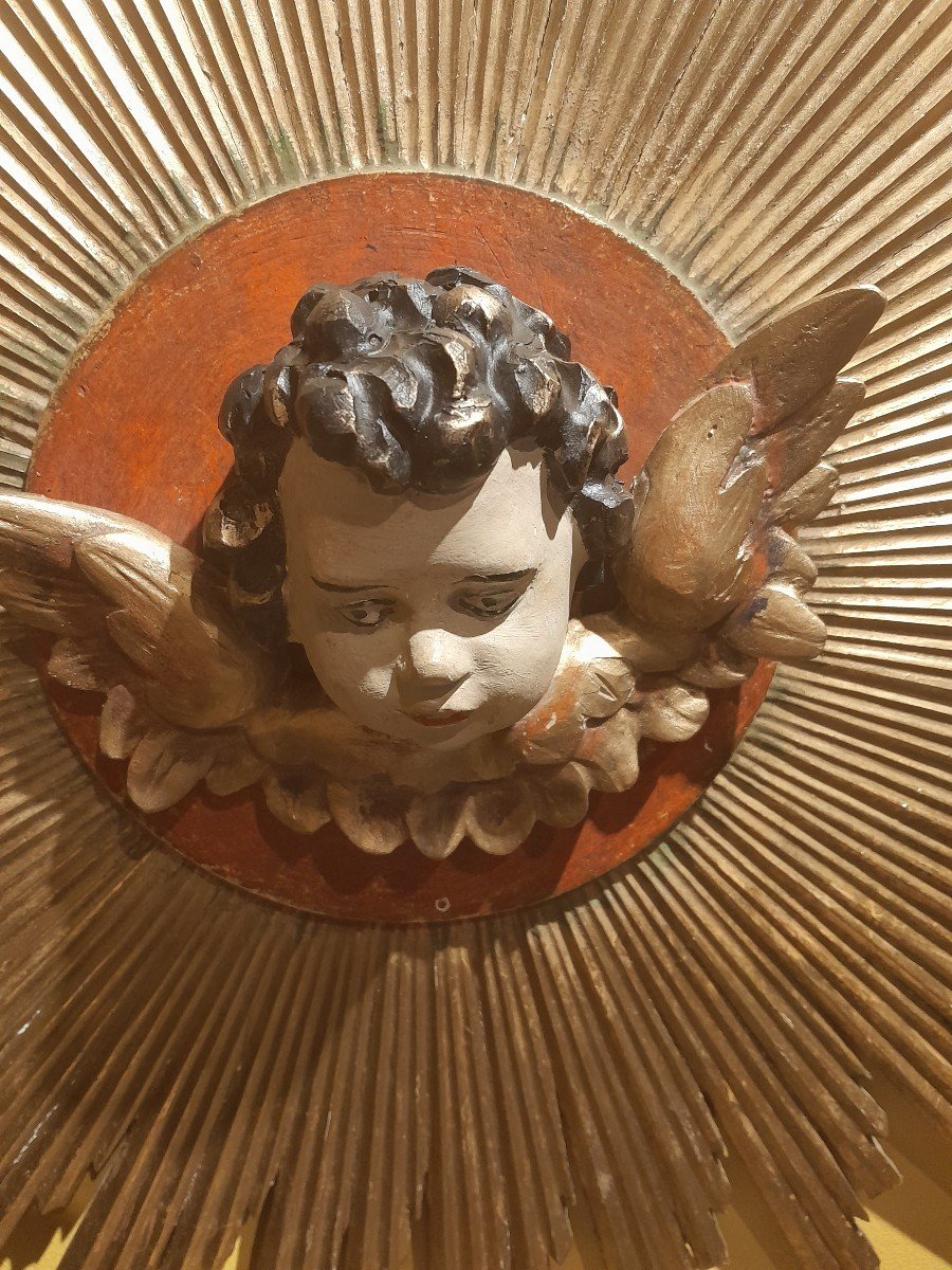 Cherub Head On Sun Background-photo-5