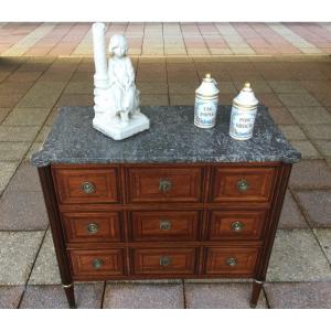 A Louis XVI Marquetry Chest Of Drawers. 