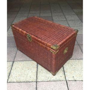 A Woven Wicker Trunk That Can Be Used As A Coffee Table 