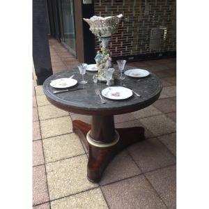 A Large Mahogany Pedestal Table That Can Be Used As A Dining Room Table