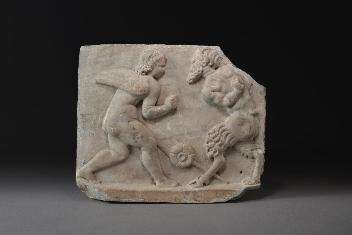 Bas-relief Depicting A Fight Between Eros And Pan, Roman Period, Circa 300 Ad.