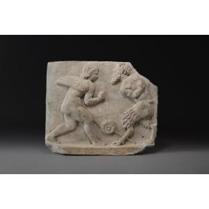 Bas-relief Depicting A Fight Between Eros And Pan, Roman Period, Circa 300 Ad.