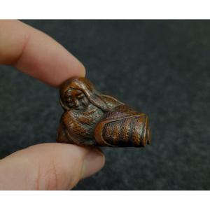 Netsuke - Sleeping Shōjō - Wood