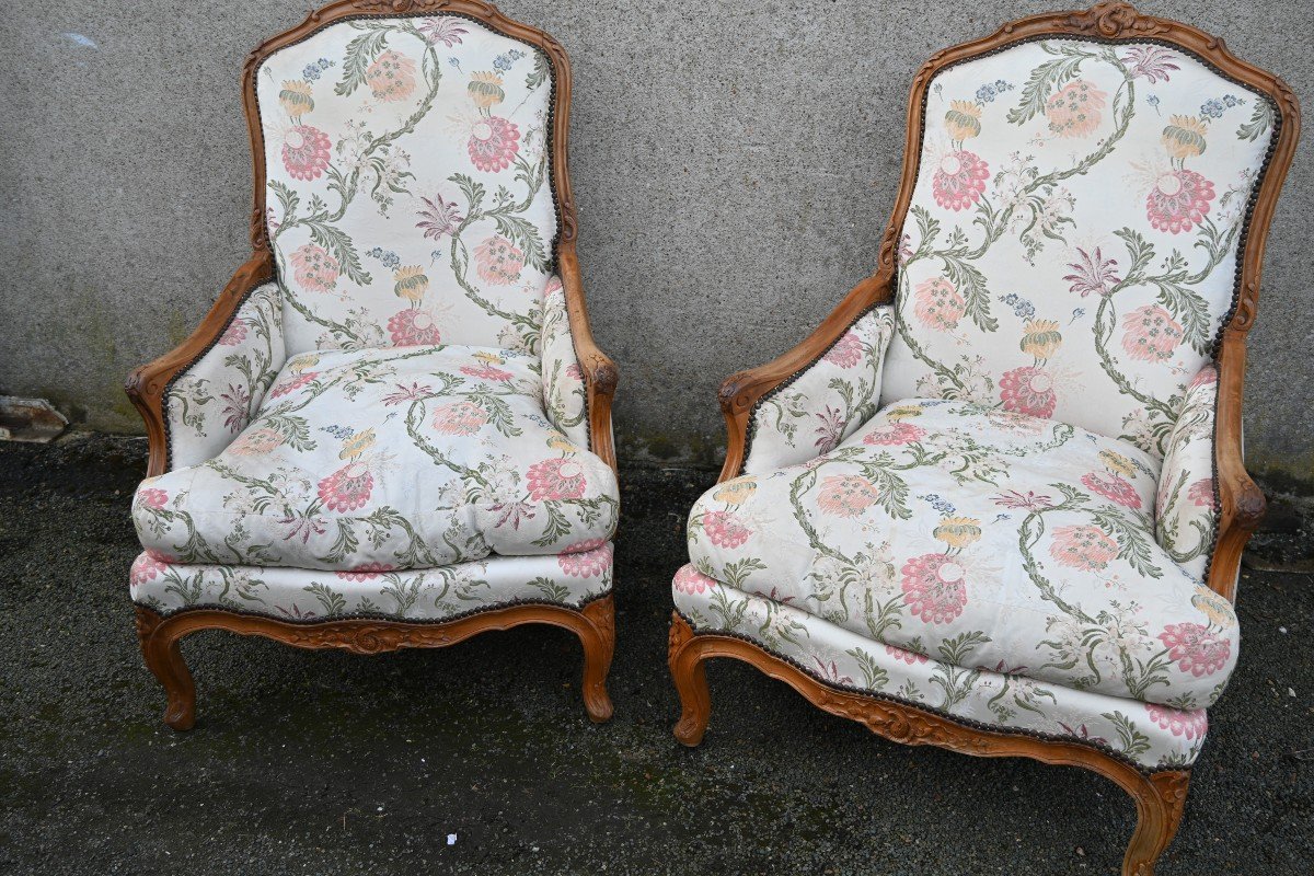 Pair Of Large Louis XV Period Natural Wood Fireside Bergeres 