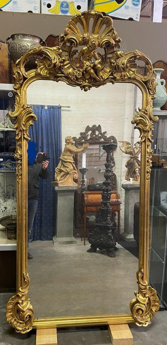 Large Louis XV Style Mirror With Putti In Gilded Wood 19th Century.