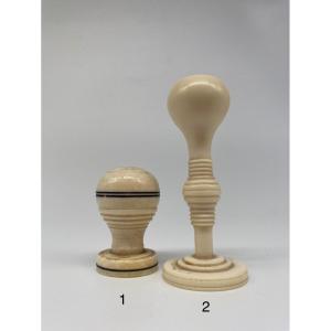 Turned Ivory Chess Pieces: A Queen And A Pawn