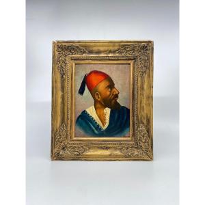 Oil On Panel: Orientalist Portrait Of A Man In A Fez