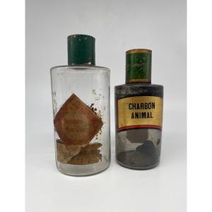 Pair Of Glass Pharmacy Bottles