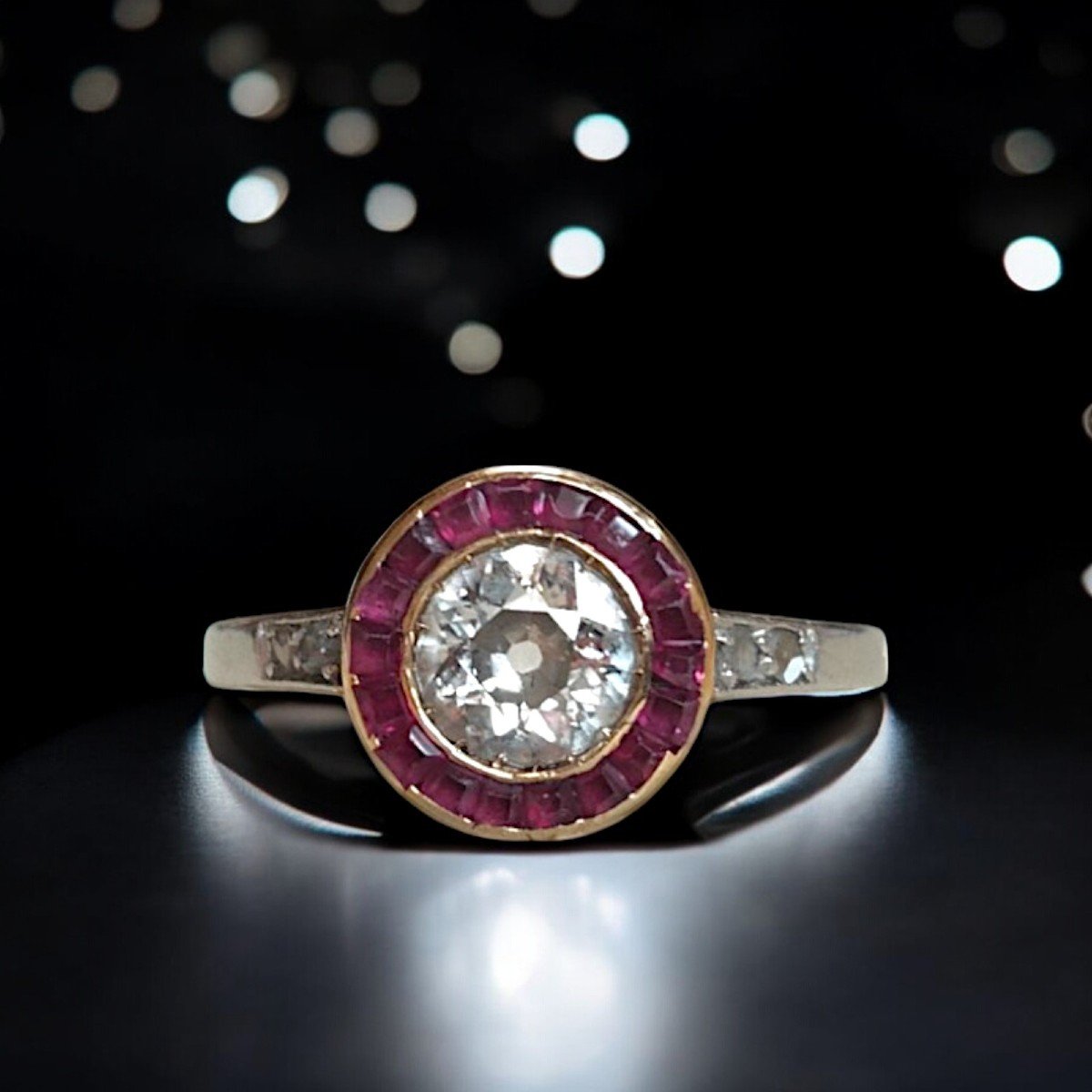 Art Deco .62 Carat Diamond And Burma Ruby Halo Ring. C1925