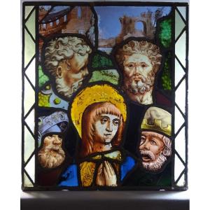 Polychrome Renaissance Period Stained-glass Window Decorated With Four Male Faces Framing The Virgin And Architectural Ruins