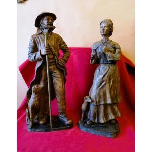 Paire de statues en bois sculpté 