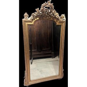 Louis XVI Style Golden Mirror With Floral Pediment