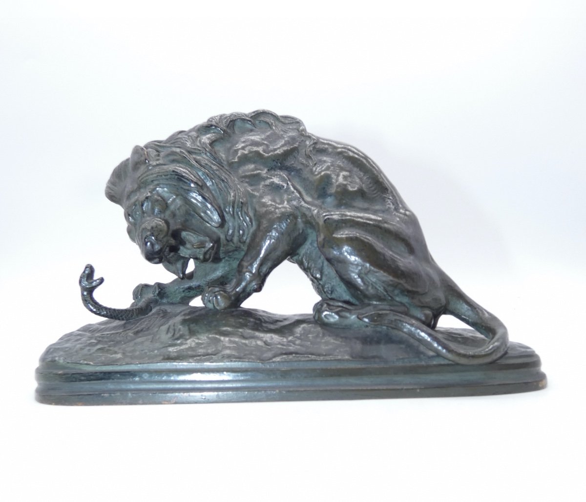 Bronze Sculpture Representing A Lion With A Serpent Sign V. Path