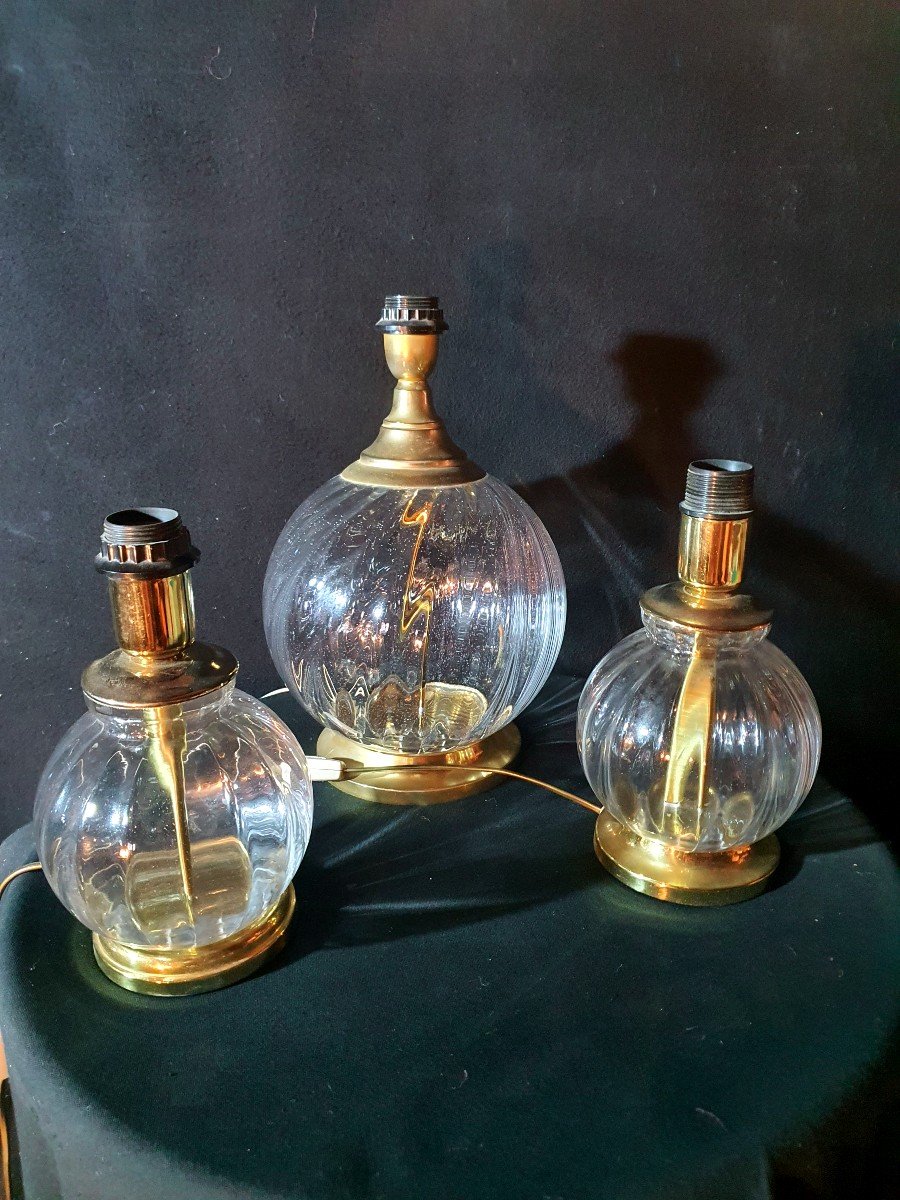 Series Of Three Hollywood Regency Glass And Brass Lamps.