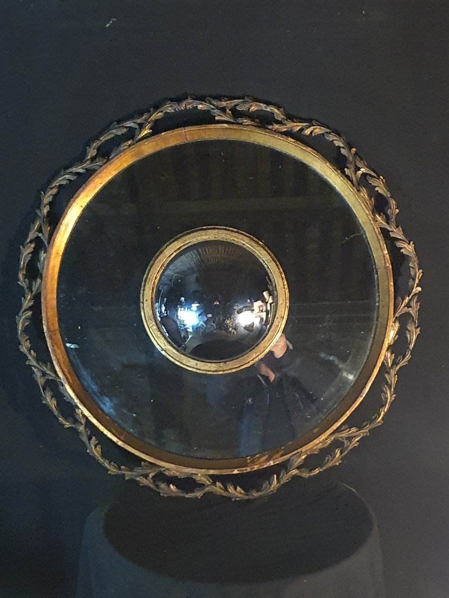 Large Double Convex Witch Mirror In Golden Wood. -photo-1