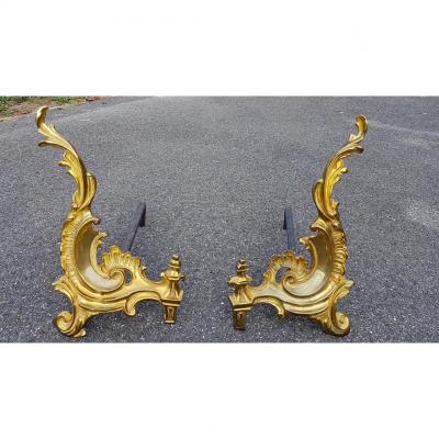 Pair Of Louis XV Style Andirons In Gilded Bronze.