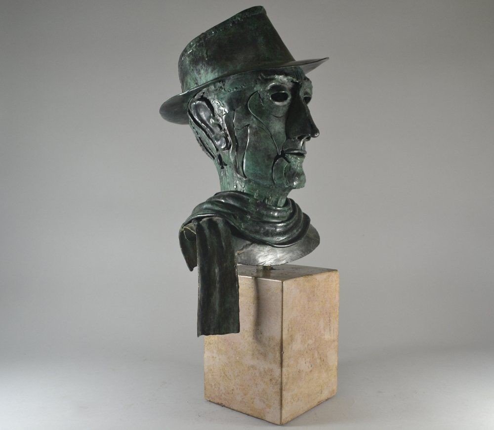 Bronze Bust Of A Man With Hat And Scarf.