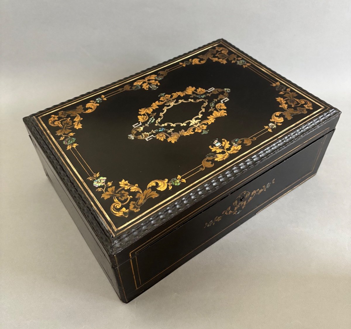 The Wooden Box Is Inlaid With Bronze And Mother-of-pearl.