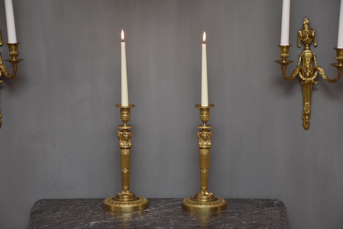 A   Pair Of Gilt Bronze Empire Candlesticks