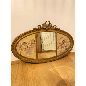 Miroir Doré Ovale Biseauté Entouré De Deux Peintures D’angelots 110cm X 70cm