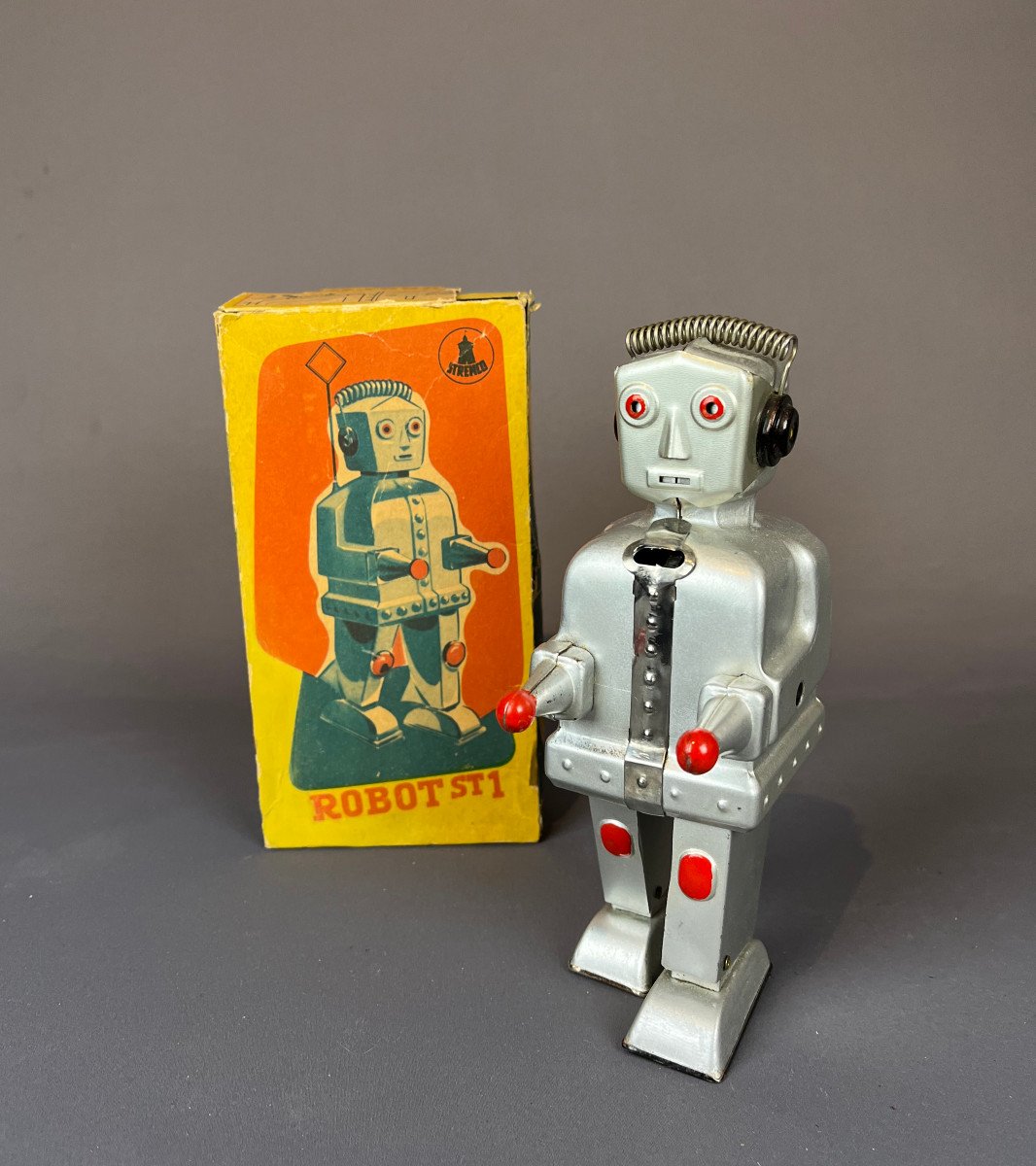 Un joli petit robot jouet de style ancien Tin Toys vintage en