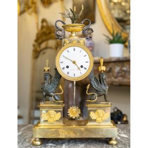 Directoire Period Clock In Gilded And Patinated Bronze.