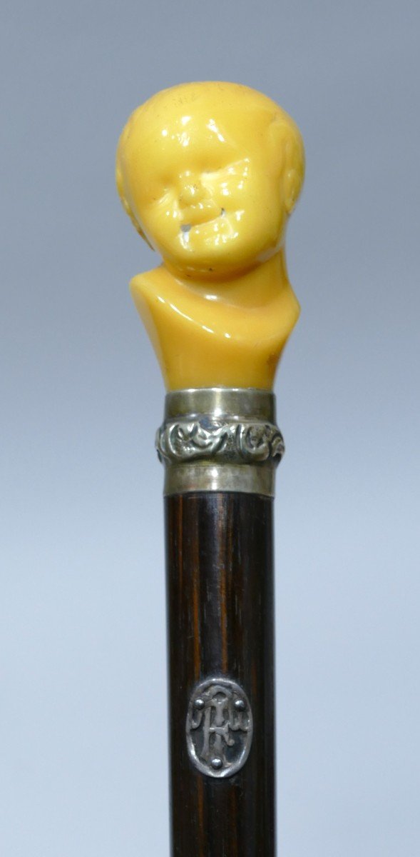 Collection Cane Representating A Child's Head Leaning