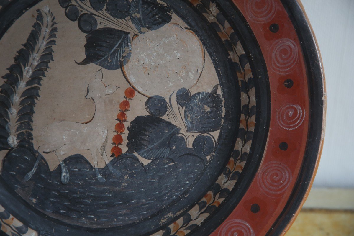 Large Circular Terracotta Dish With Peacock Decoration In A Landscape.-photo-1