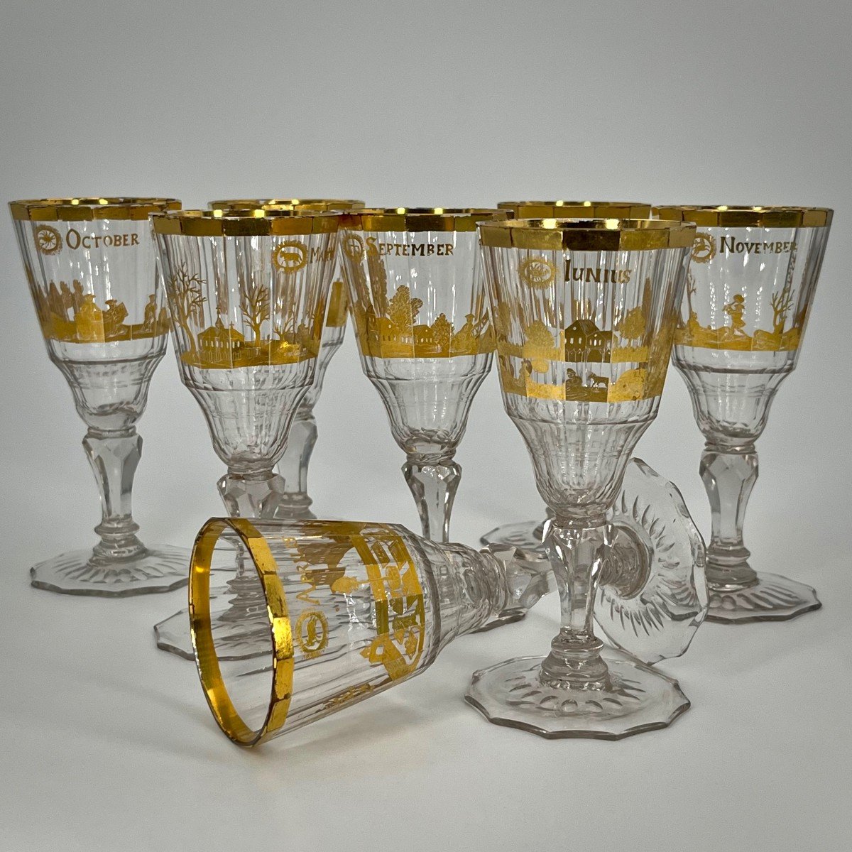 Suite Of Eight 18th Century Glasses With Gilded Decoration Of Peasant Activities And 18th Century Signs Of The Zodiac