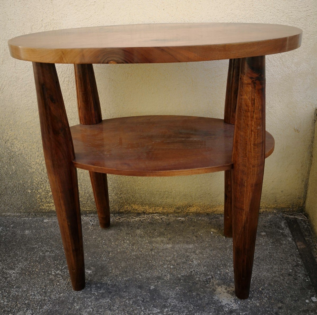 Table basse ovale en chêne foncé dessus céramique brune oxydée
