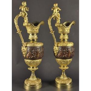 Pair Of Ceremonial Ewers In Gilt Bronze And Brown Patina