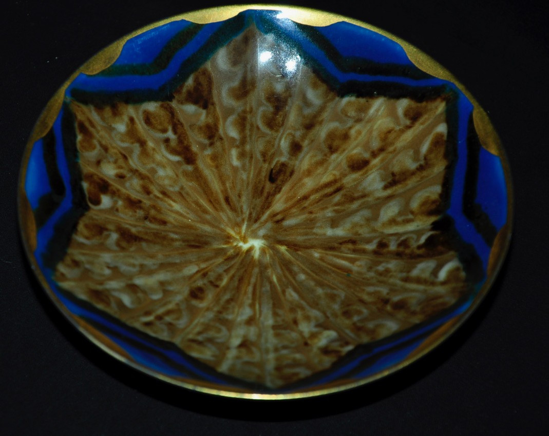 Assiette céramique signée Tharaud Limoges XXe siècle