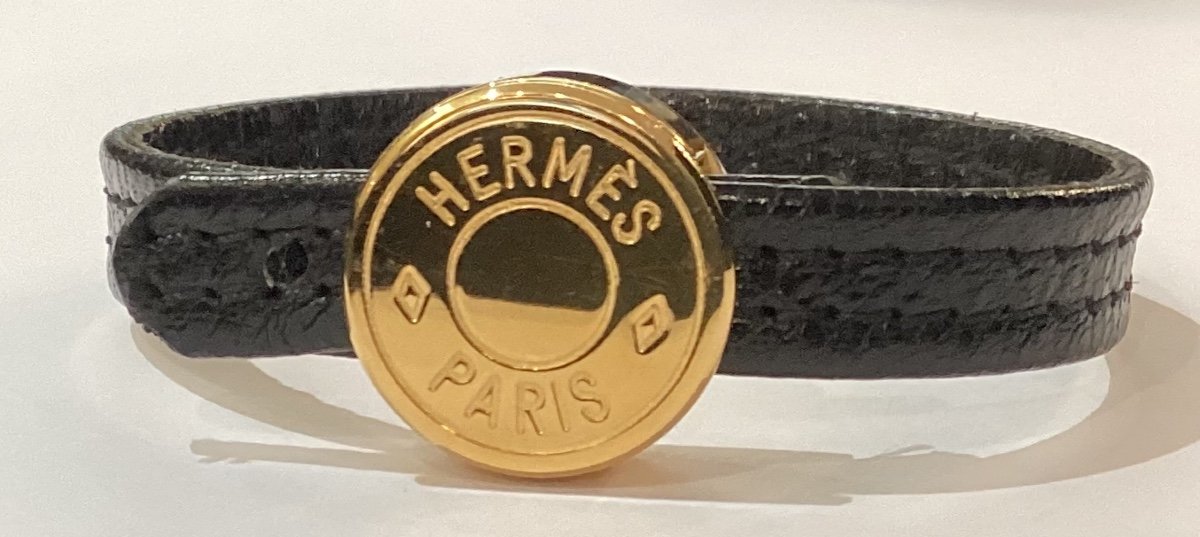 HERMÈS - bracelet en métal doré et cuir noir  -photo-3