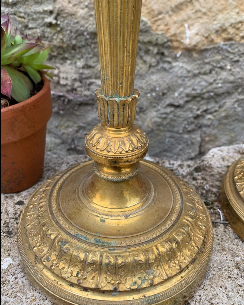 The Pair Of Candlesticks In Gilt Bronze -photo-1