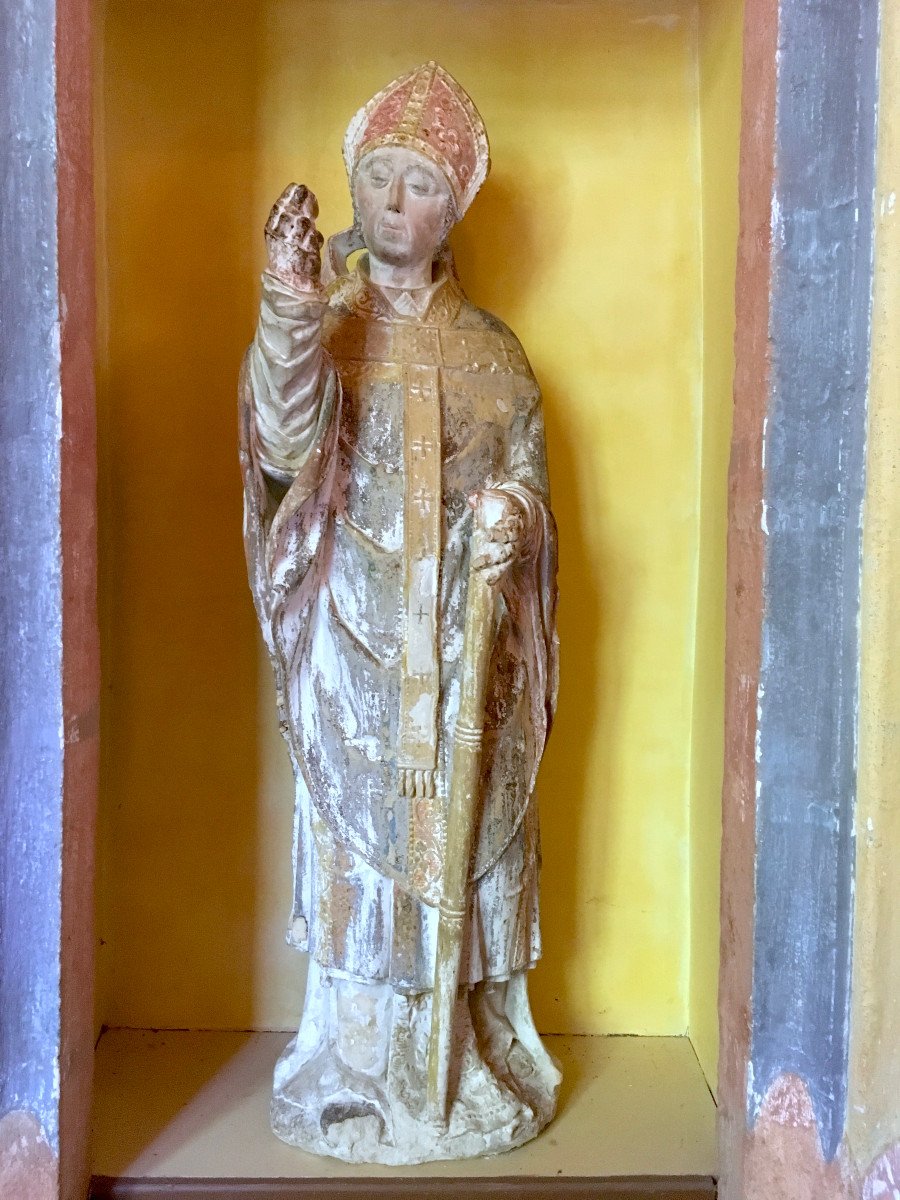 Statue Of Saint Remi In Polychrome Bourbonais Stone. France Late 13th - Early 14th Century. 