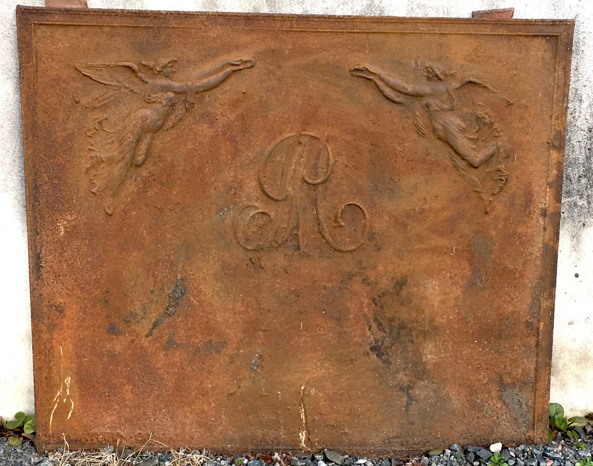 Large Cast Iron Fireback With Central Monogram And Winged Women. Early 19th Century.