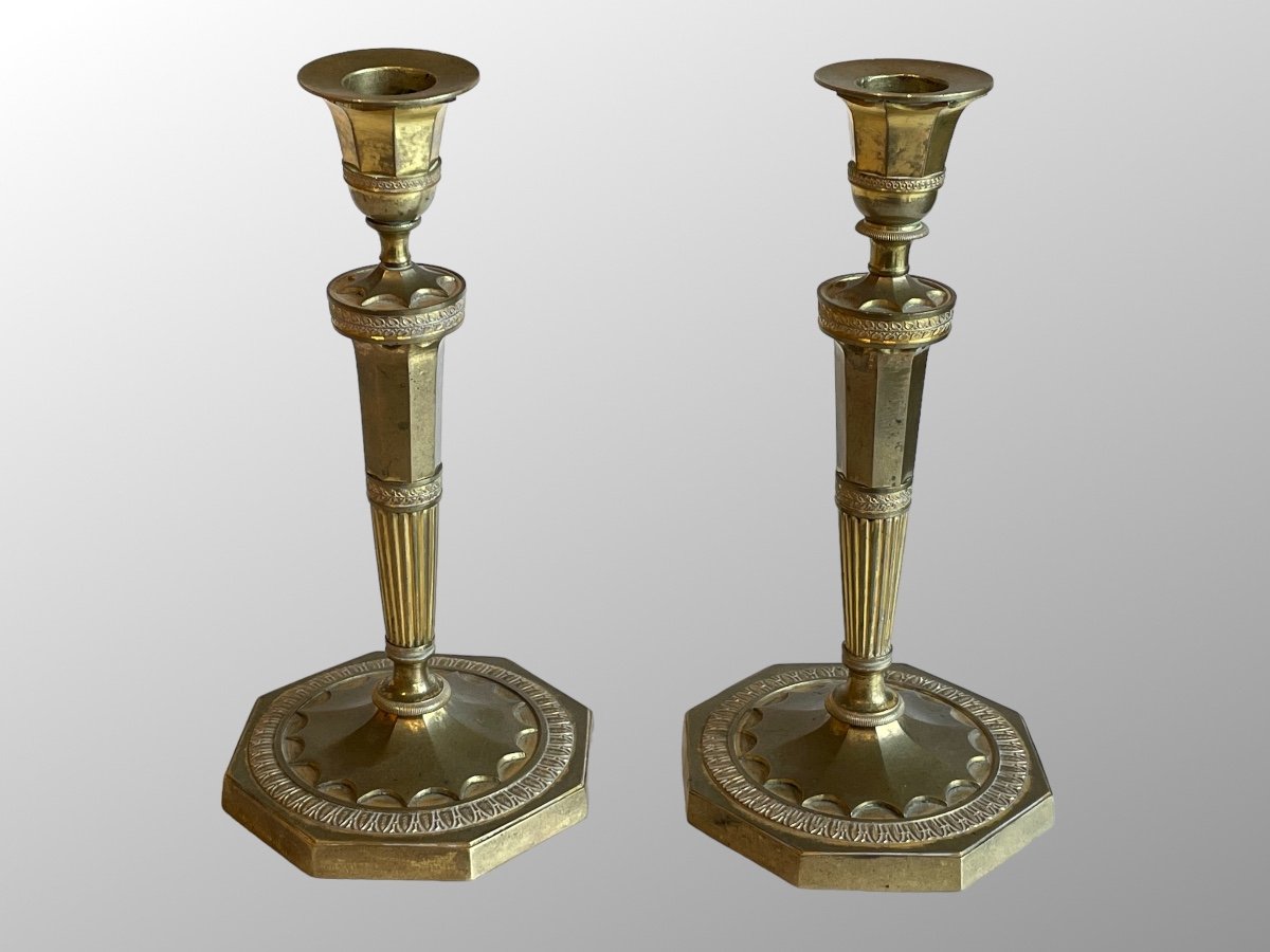 Pair Of Bronze Candlesticks From The Early 19th Century.