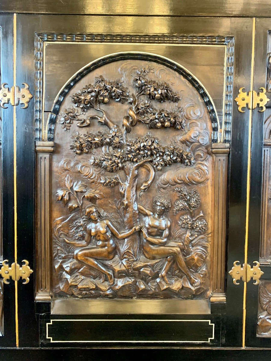 Blackened Wood Cabinet Carved With A Scene Depicting Adam And Eve In The Garden Of Eden -photo-4