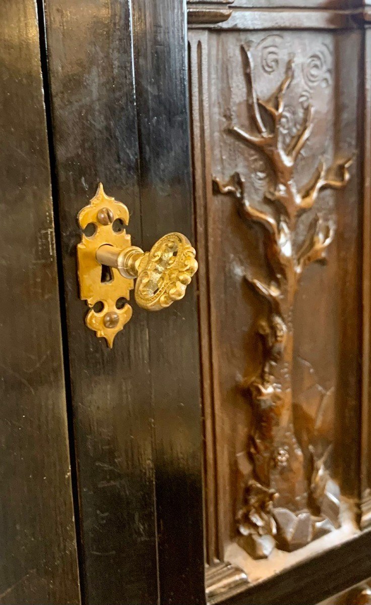 Blackened Wood Cabinet Carved With A Scene Depicting Adam And Eve In The Garden Of Eden -photo-4