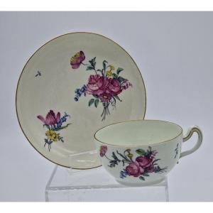 Cup And Saucer In Soft Porcelain From Tournai With Floral Decoration In Polychrome And Gold. Gold Swords.