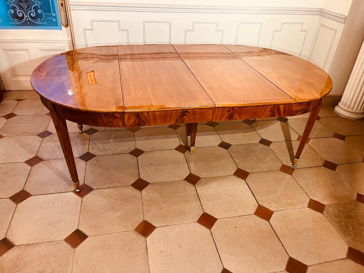 Table ovale à bandeau en acajou Directoire 