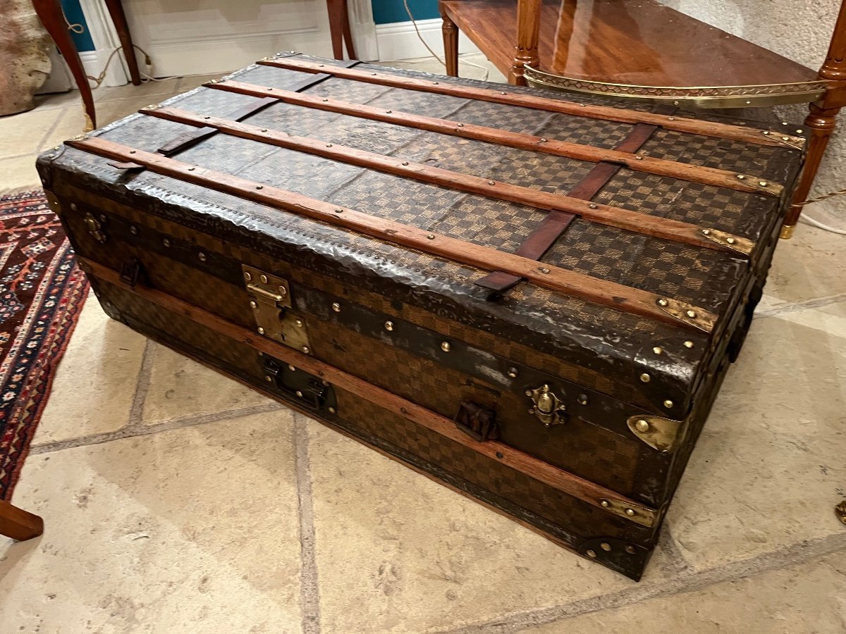 Old Travel Trunk Topped With Waxed Checkered Canvas-photo-1