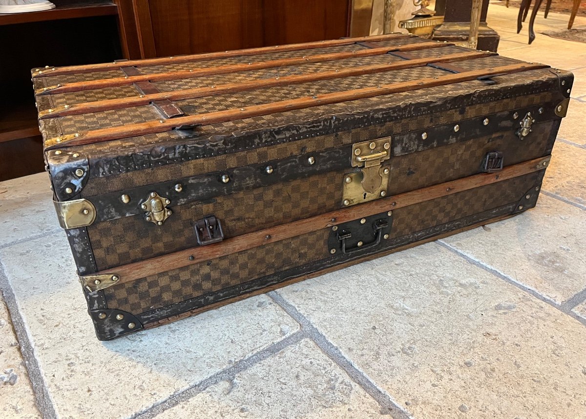 Old Travel Trunk Topped With Waxed Checkered Canvas