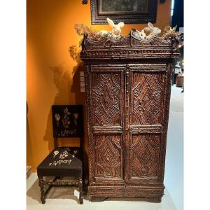 Two-door Cabinet Made Of Hazel Bark And Twigs