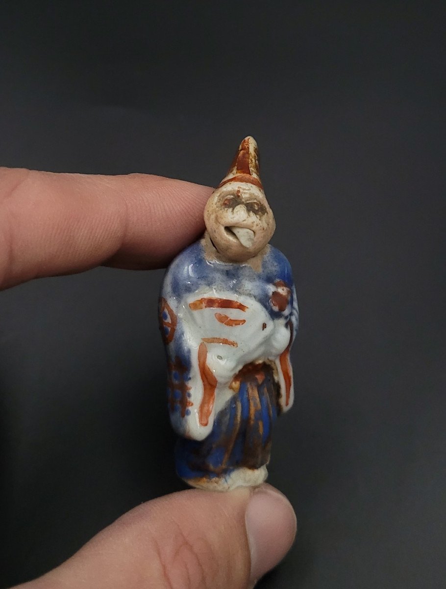 Netsuke - Monkey Disguised As A Sambaso Dancer - Porcelain - Late 19th Century