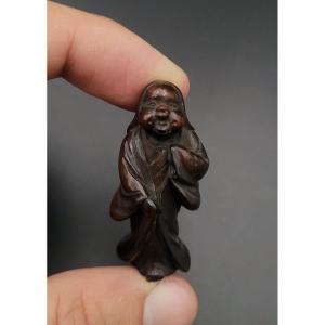 Netsuke - Okame - Wood - 19th Century